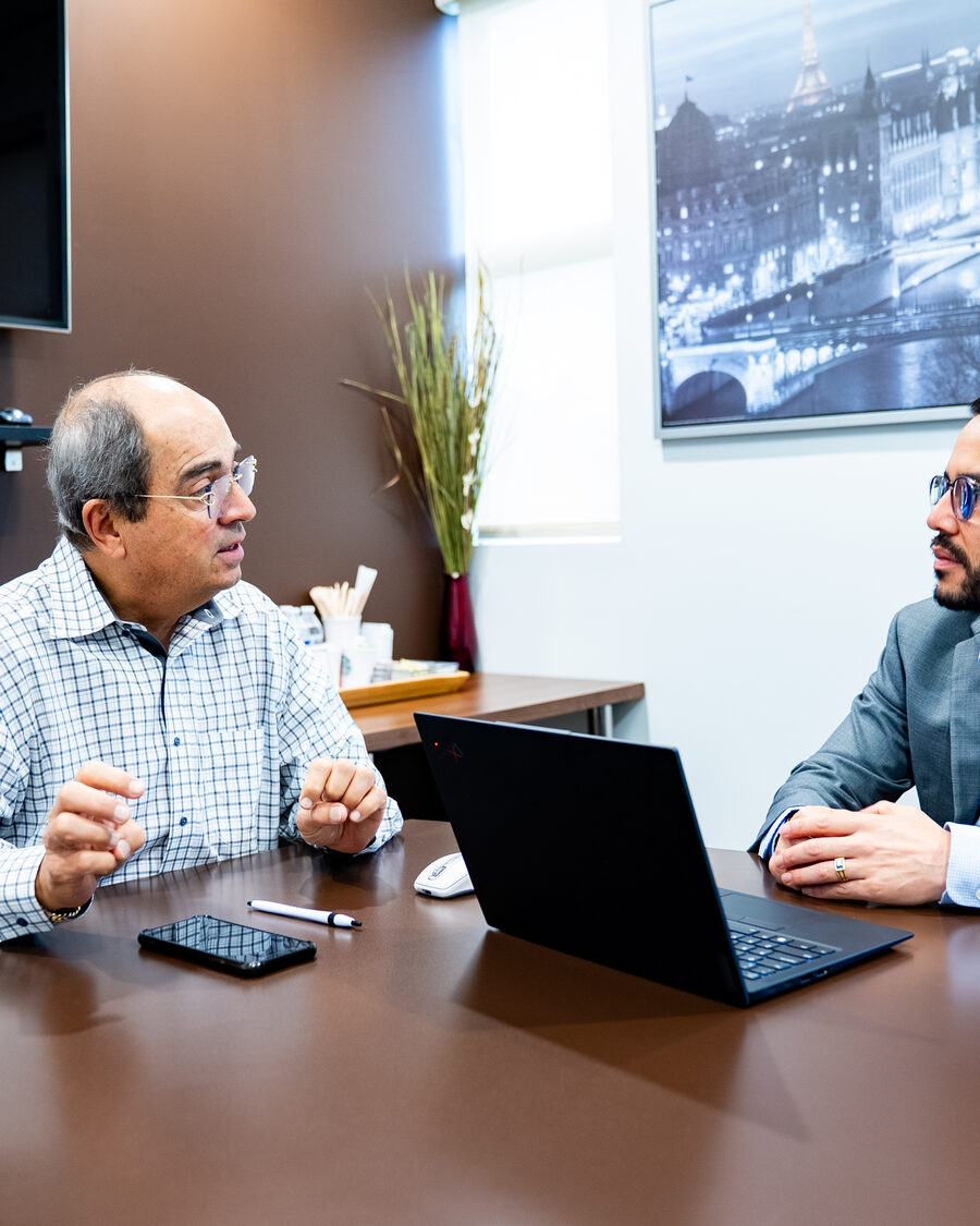 Javier Sanchez, CPA, reviewing financials with a client during a CFO strategy meeting